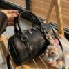 Textured Barrel Crossbody Bag