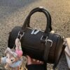 Textured Barrel Crossbody Bag