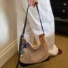 cf1be749-c74c-4194-8dfc-40423176e98c-Max-Origin.jpg Leather Trim Woven Shoulder Bag